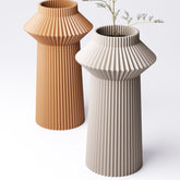 Pleated hourglass vase, angled view showing the ribbed texture