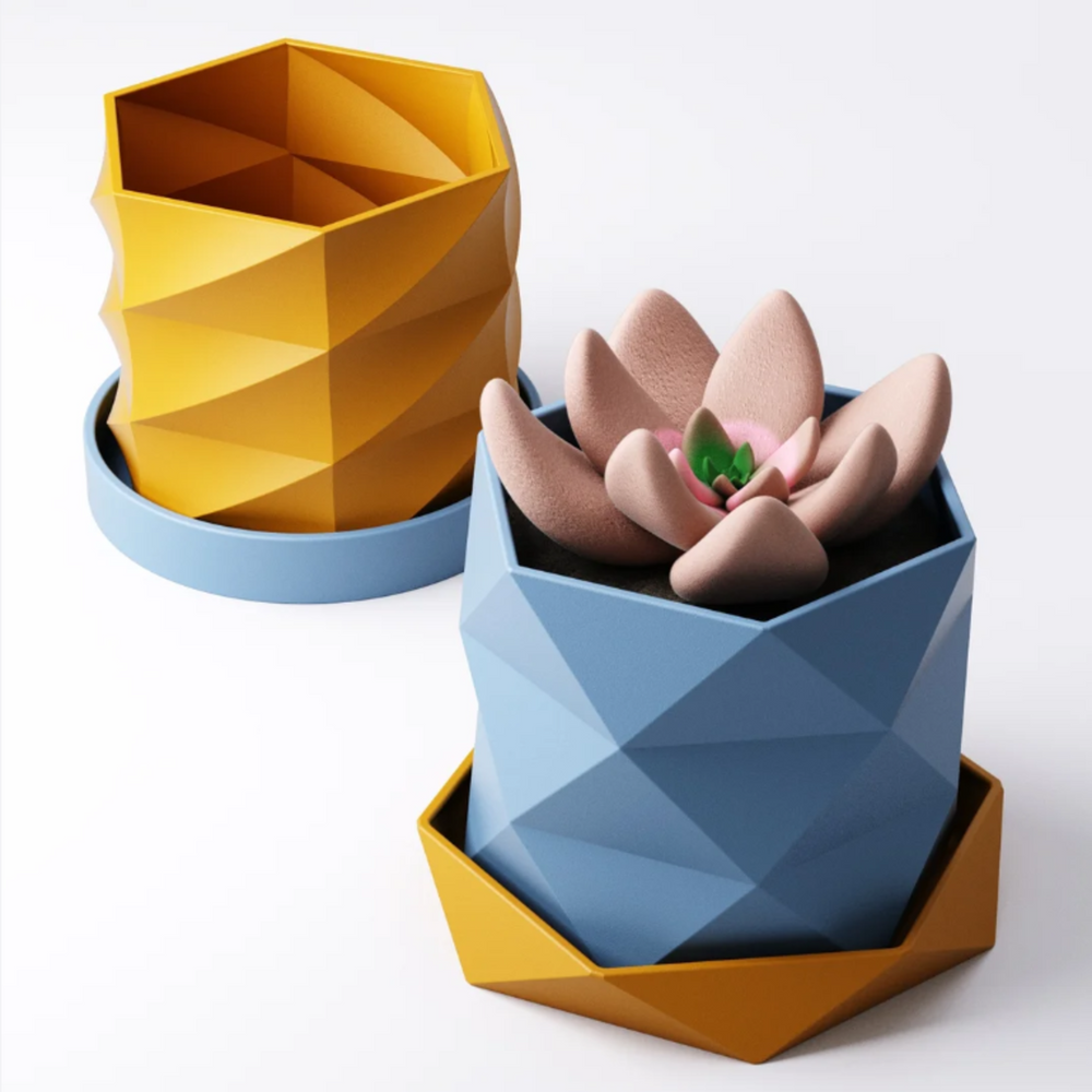 A 3D printed blue geometric planter with a twisted, faceted design, shown floating above its matching yellow hexagonal drip tray against a white background.