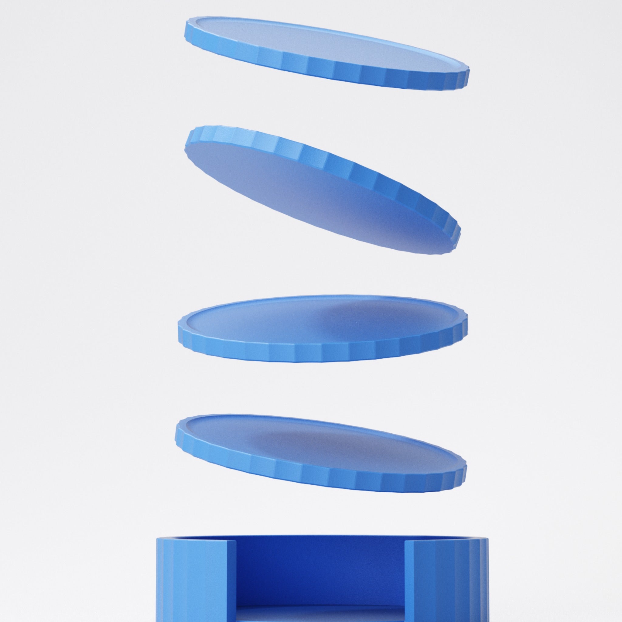 Four matching coasters stacked neatly inside their ribbed holder