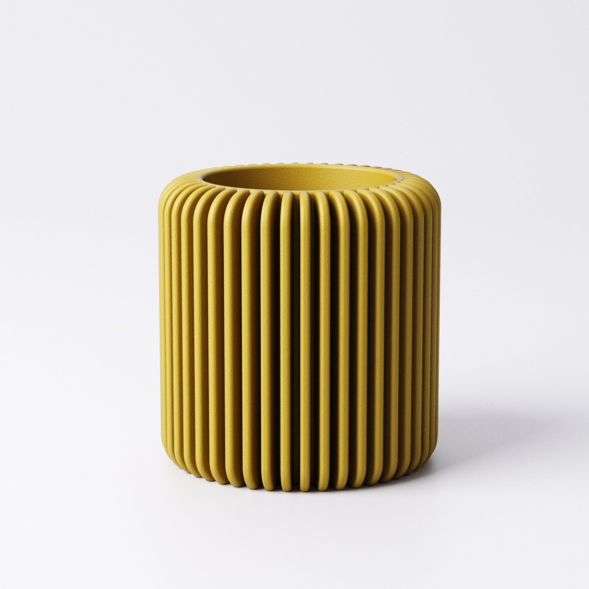 Fin tealight holder, Medium size shown with LED tealight glowing inside