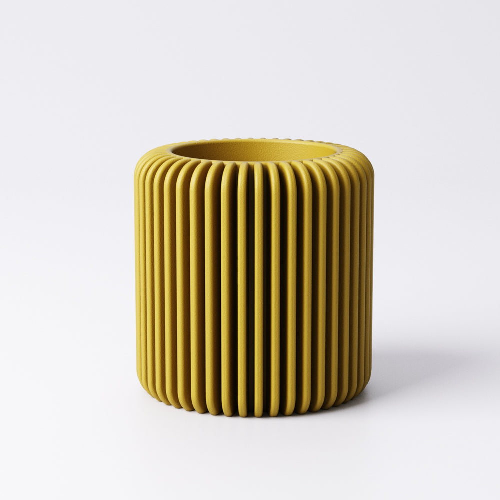 Fin tealight holder, Medium size shown with LED tealight glowing inside
