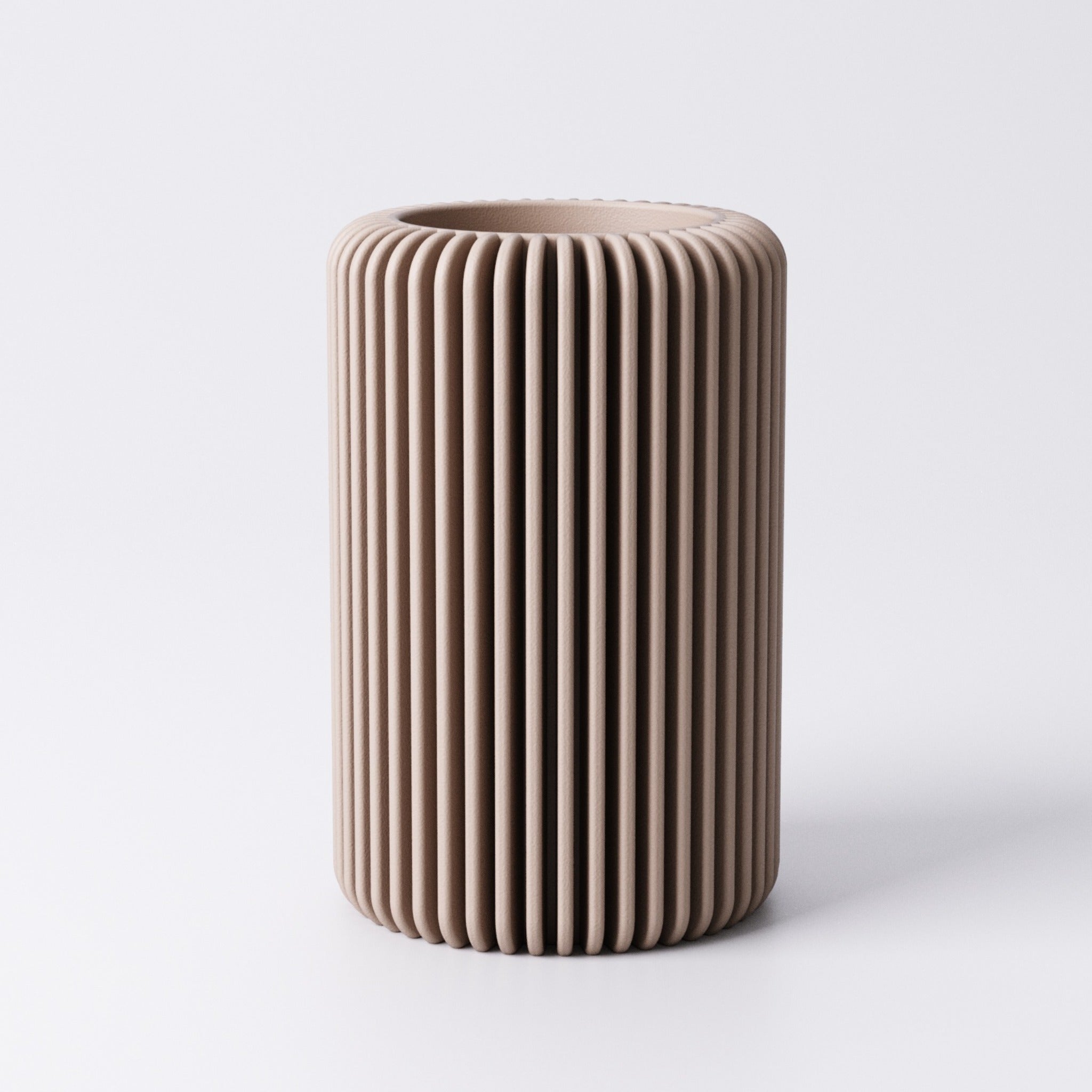 Fin tealight holder, Small and Medium sizes shown side by side