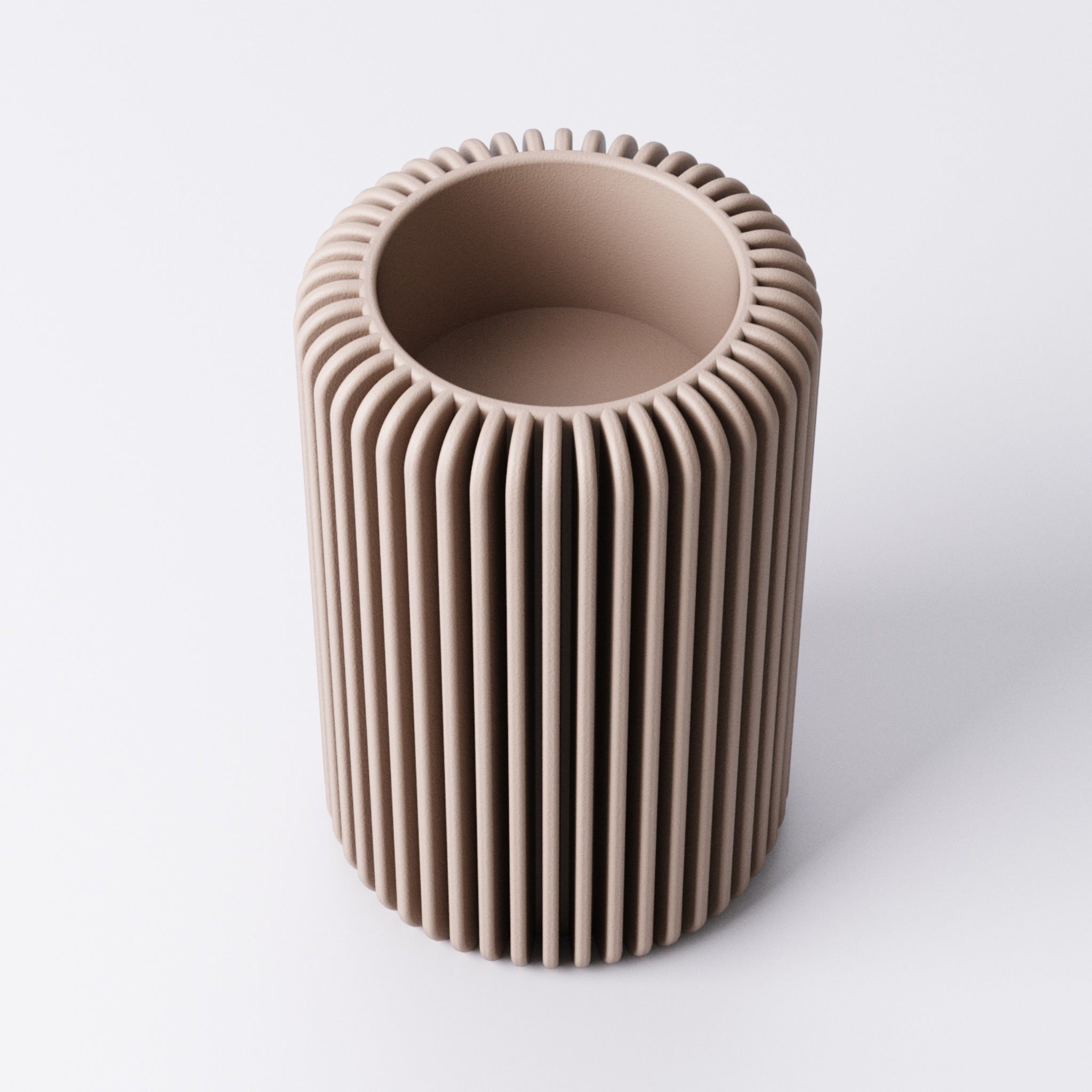 Fin tealight holder, front view showing the ribbed texture
