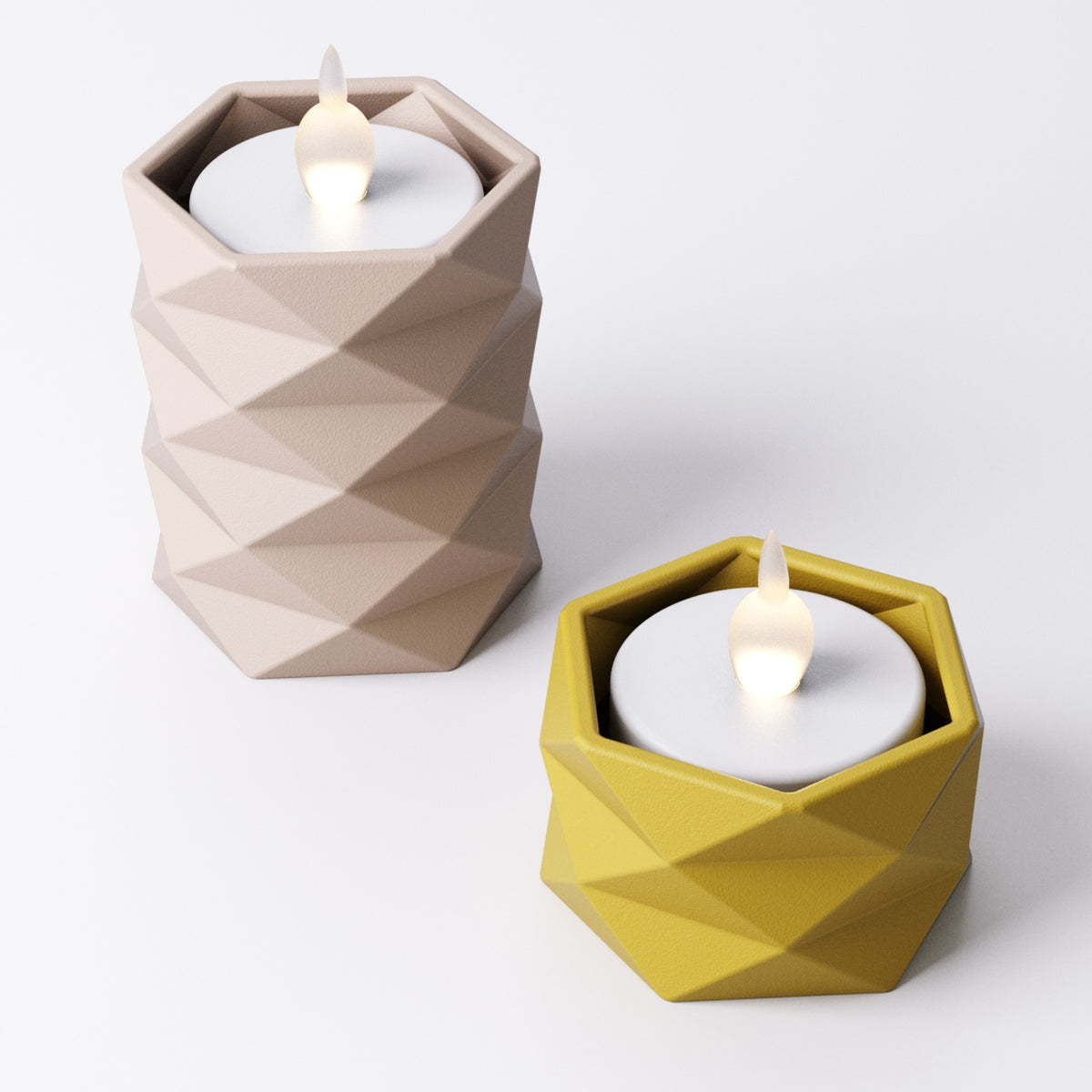 Geometric tealight holder, angled view showing the faceted texture and open top