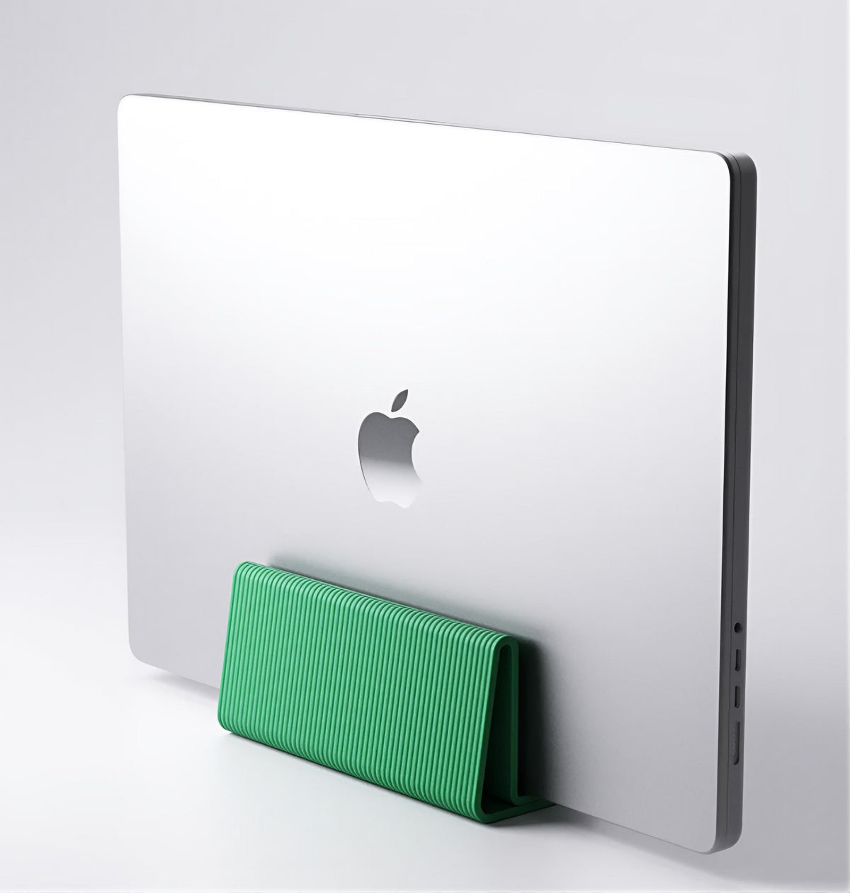 Vertical laptop stand | minimalist ribbed design desk organisation | space-saving holder | stylish accessory