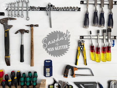 Funny workshop sign: 'man glitter' saw blade decor for garage or shed