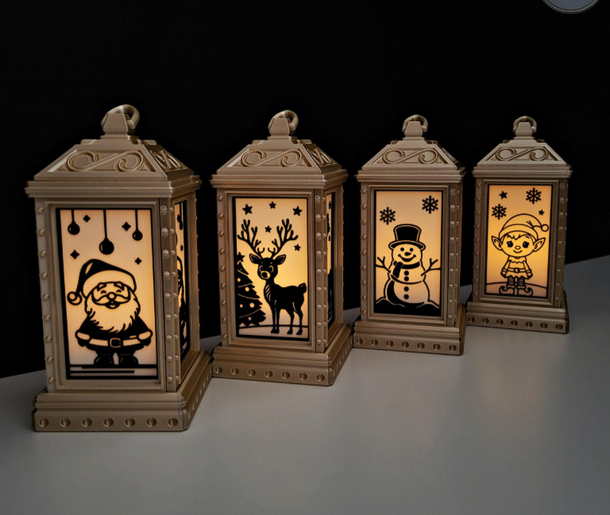 Set of 4 Christmas Lantern Decorations | LED Tealight Holders | Festive Silhouettes | family friendly | gold