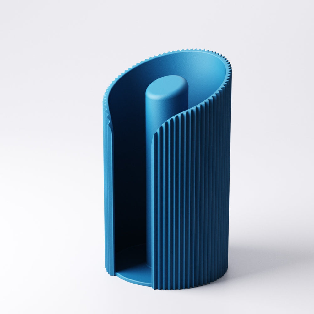 Paper towel holder in Mandarin Orange on a kitchen counter