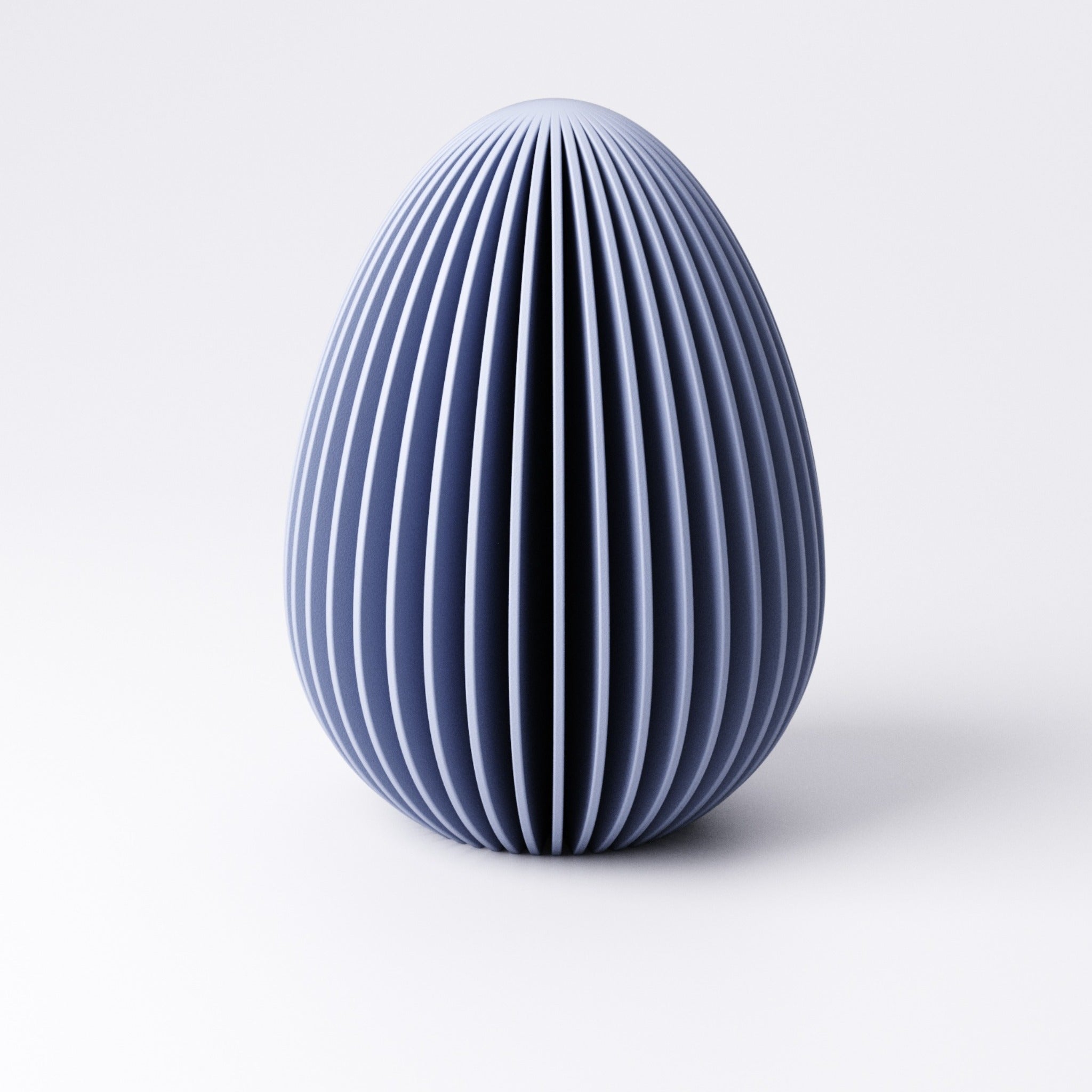Four sizes of egg decoration shown together from Extra Small to Large