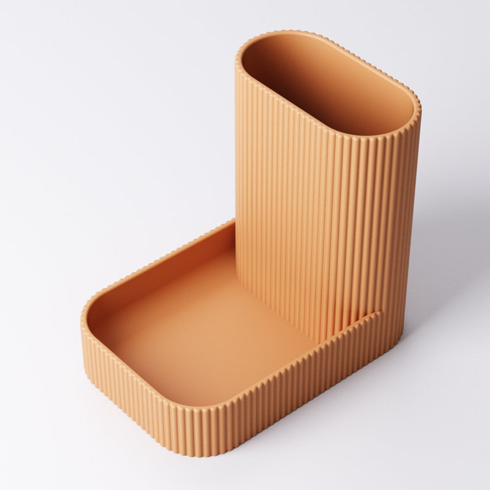Small and Large catchall and pen tray shown together