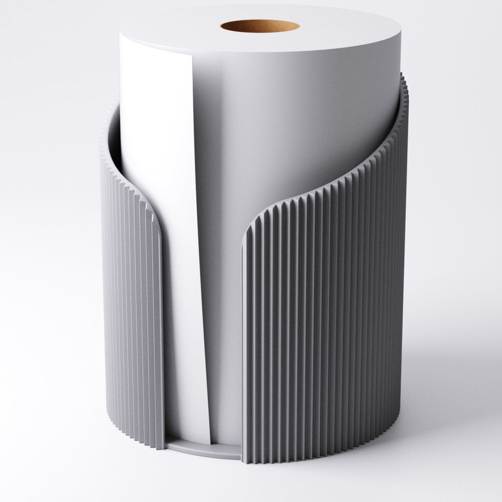 Paper towel holder on a kitchen counter holding a kitchen roll