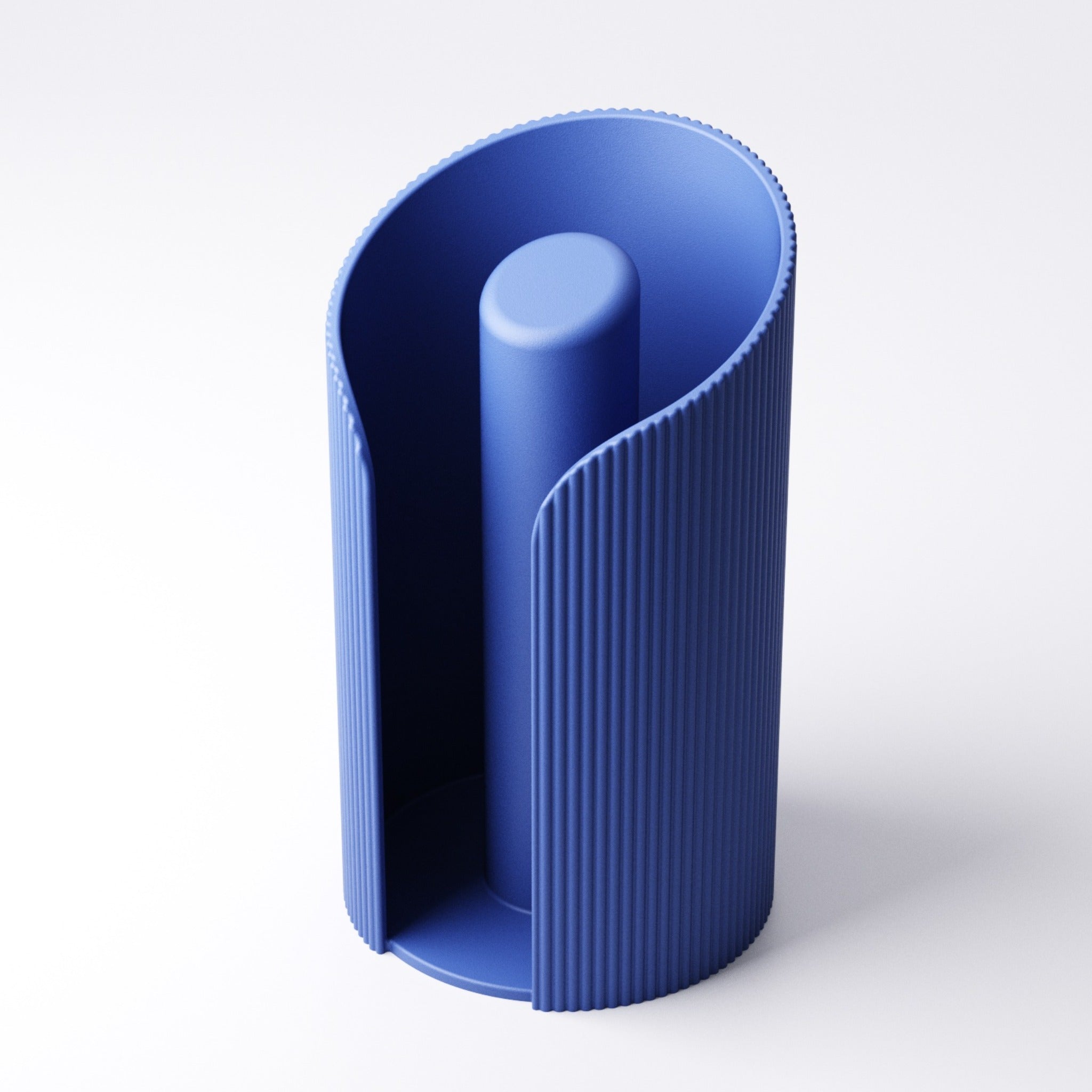 Empty Royal Blue ridged paper towel holder viewed from the front, showing the open ridged wall
