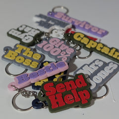 Personalised name keyring with bold raised lettering in custom colours