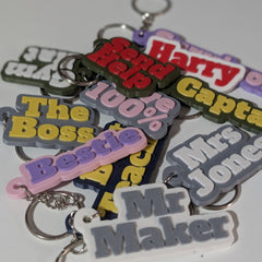 Custom colour name keyring attached to a set of keys