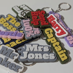 Close-up of raised letter detail on a personalised bag charm