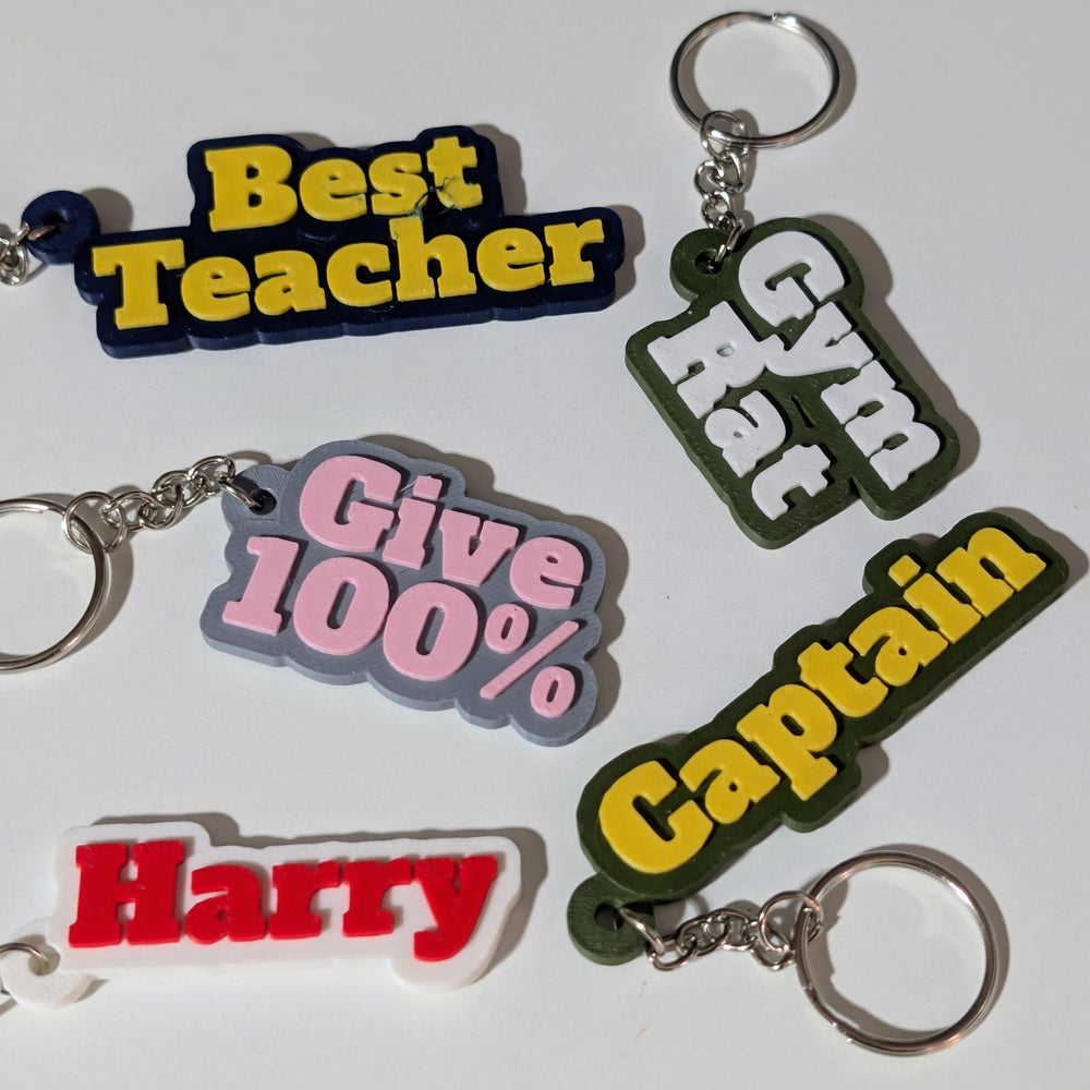 Personalised name keyring collection showing custom text and colour options