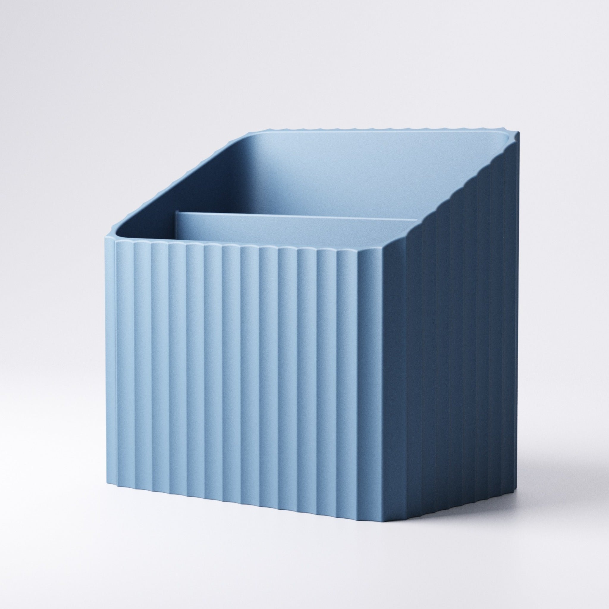 Ribbed remote control caddy shown from the side with ridged texture detail