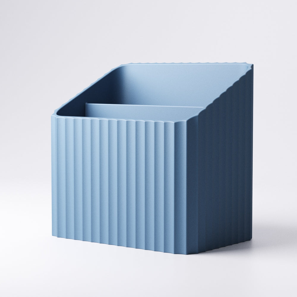 Ribbed remote control caddy shown from the side with ridged texture detail