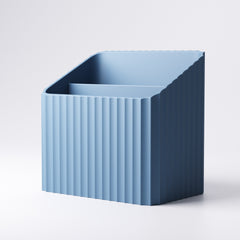 Ribbed remote control caddy shown from the side with ridged texture detail