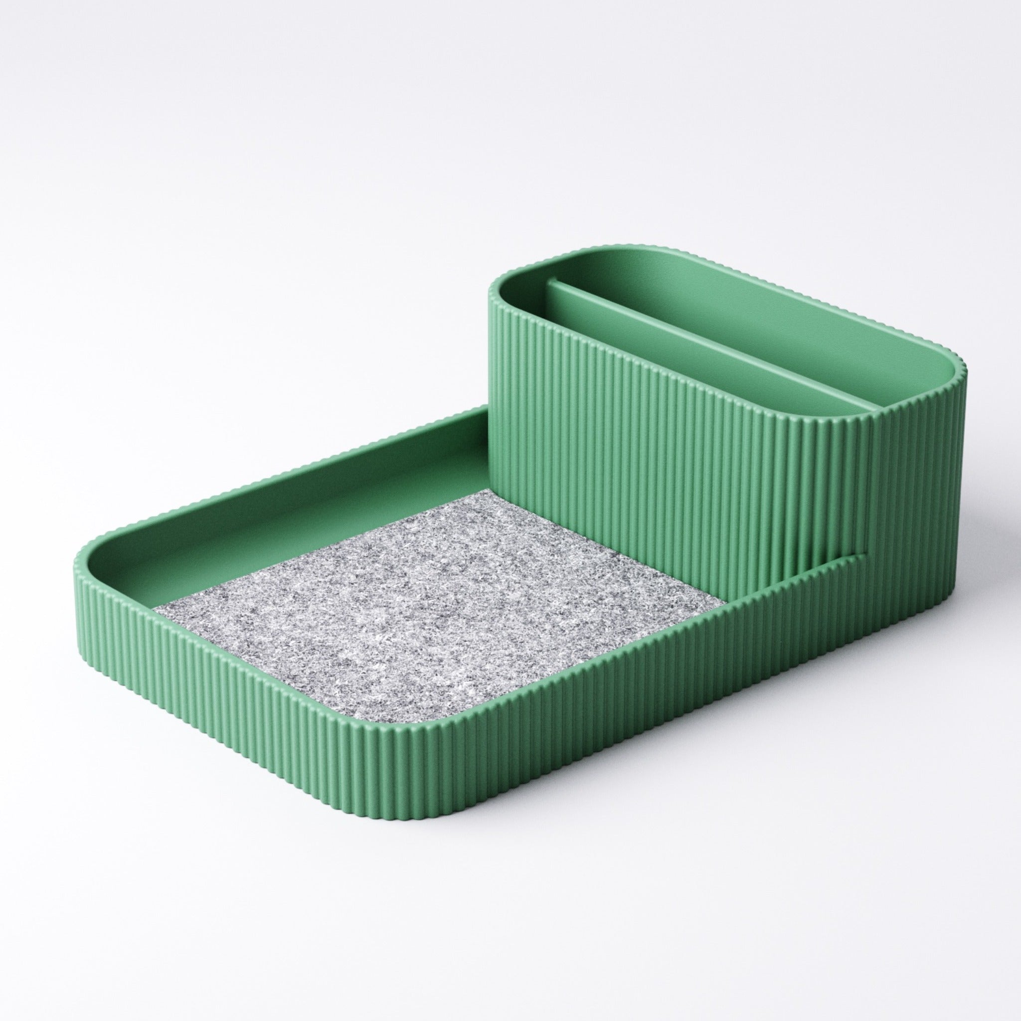 Remote holder and catchall tray shown from the front with keys inside