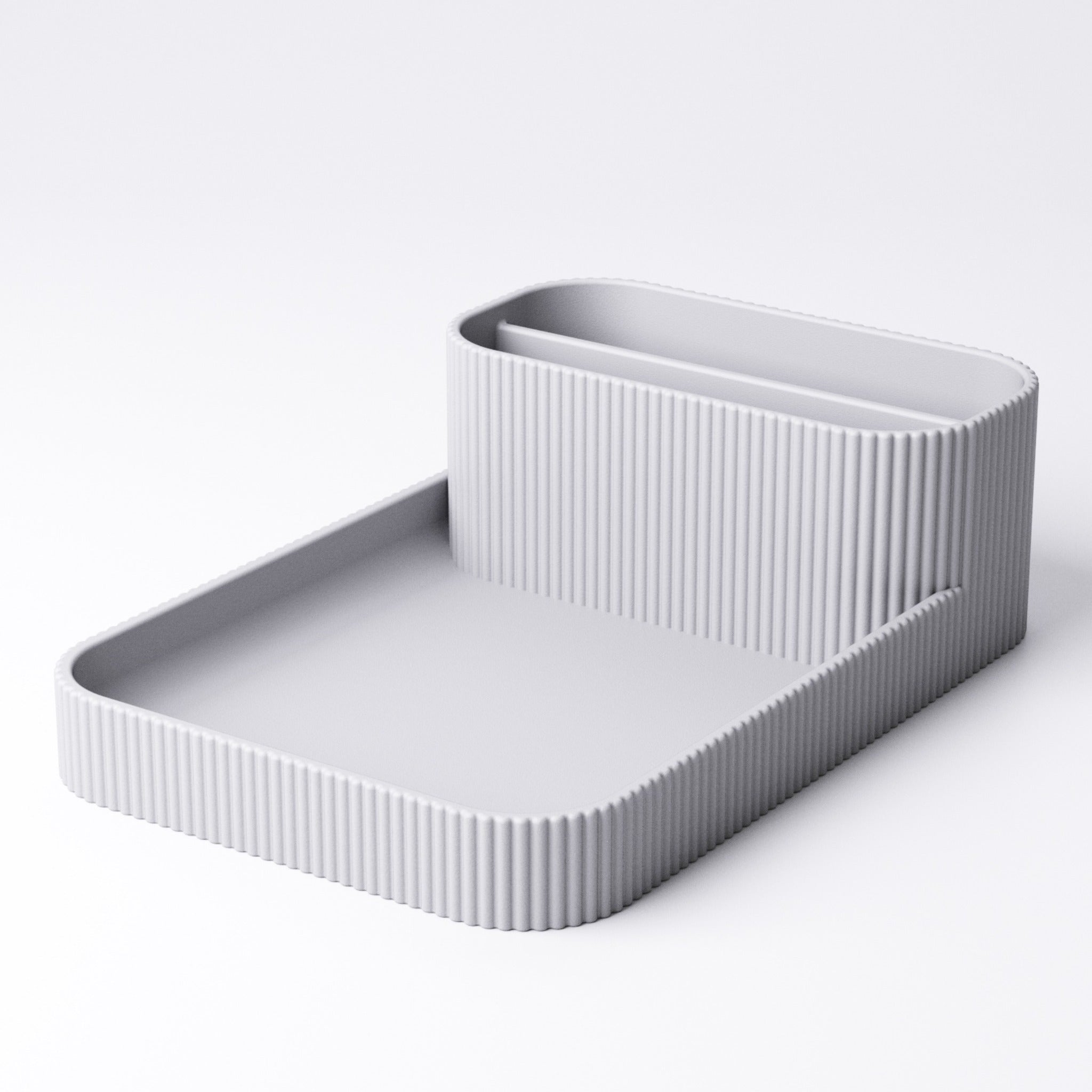 Remote holder and tray viewed from above showing both compartments