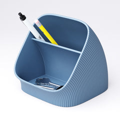 Ribbed desk organiser holding paperclips and sticky notes