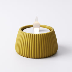 Mustard yellow ridged tealight holder, Small size, with LED tealight glowing inside