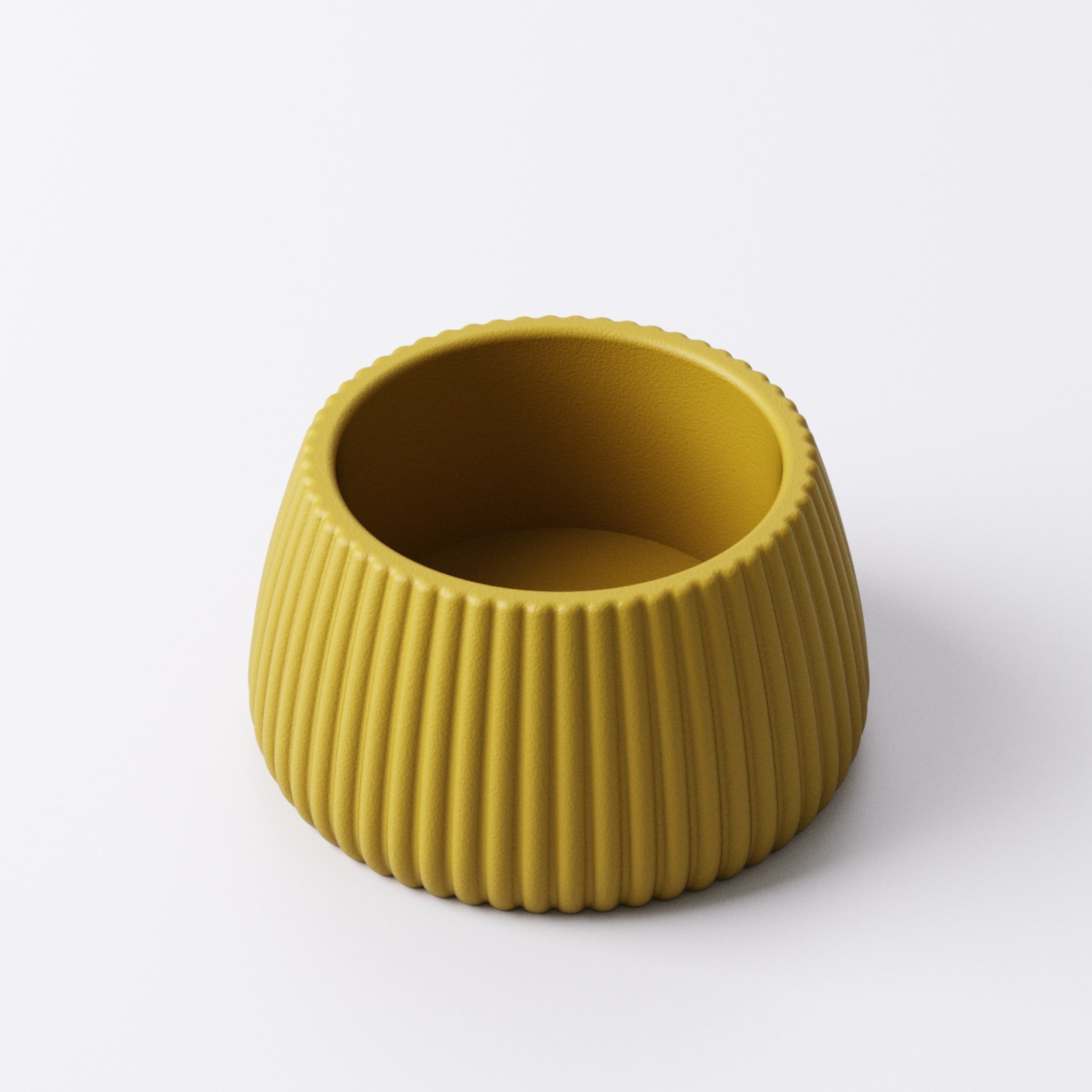 Mustard yellow ridged tealight holder, Small size, top-down angle showing the interior and ridged wall