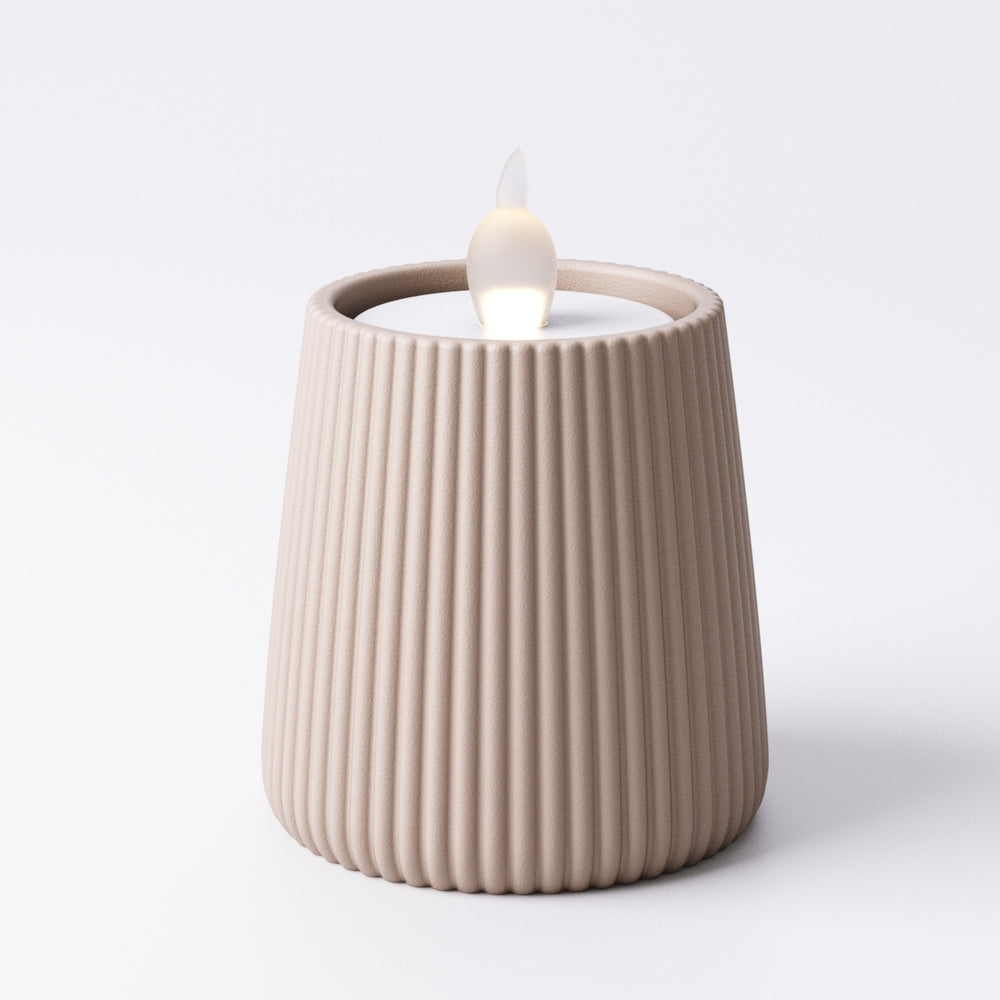 Beige ridged tealight holder, Medium size, with LED tealight glowing inside