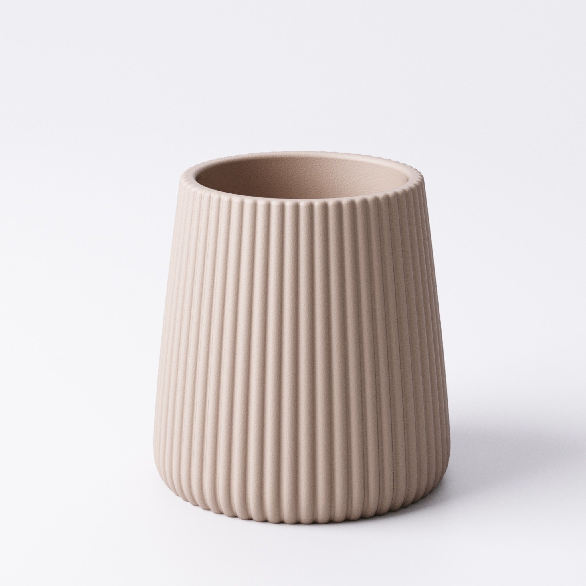 Beige ridged tealight holder, Medium size, angled view showing the ridged fin texture