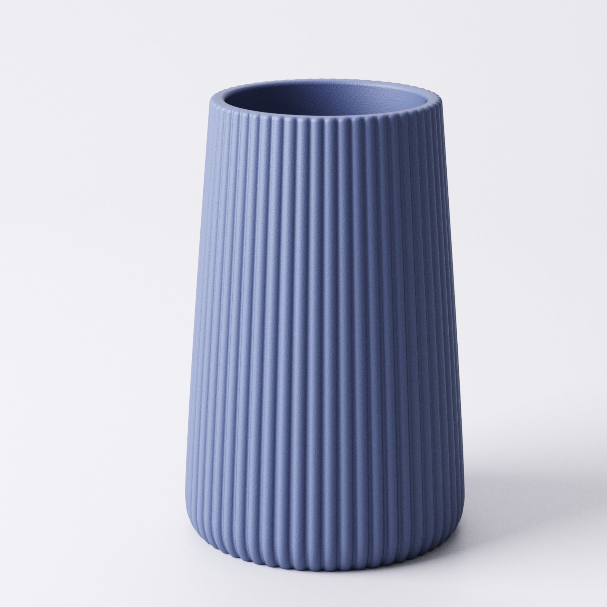 Royal Blue ridged tealight holder, Large size, front view showing the ridged fin texture