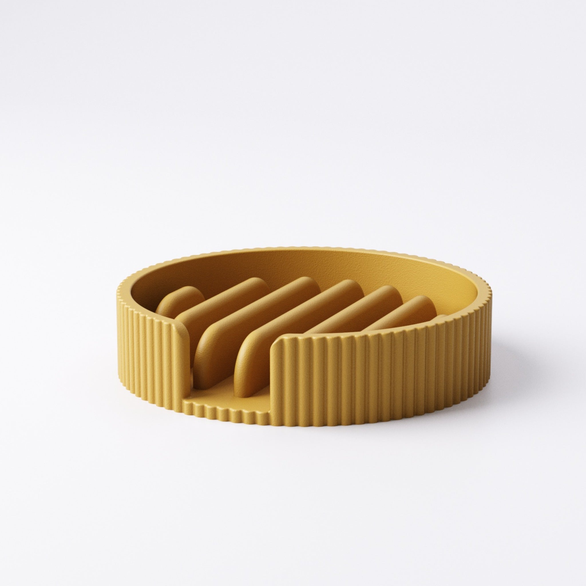 Round soap tray with diagonal ridged fins lifting a bar of soap off the base