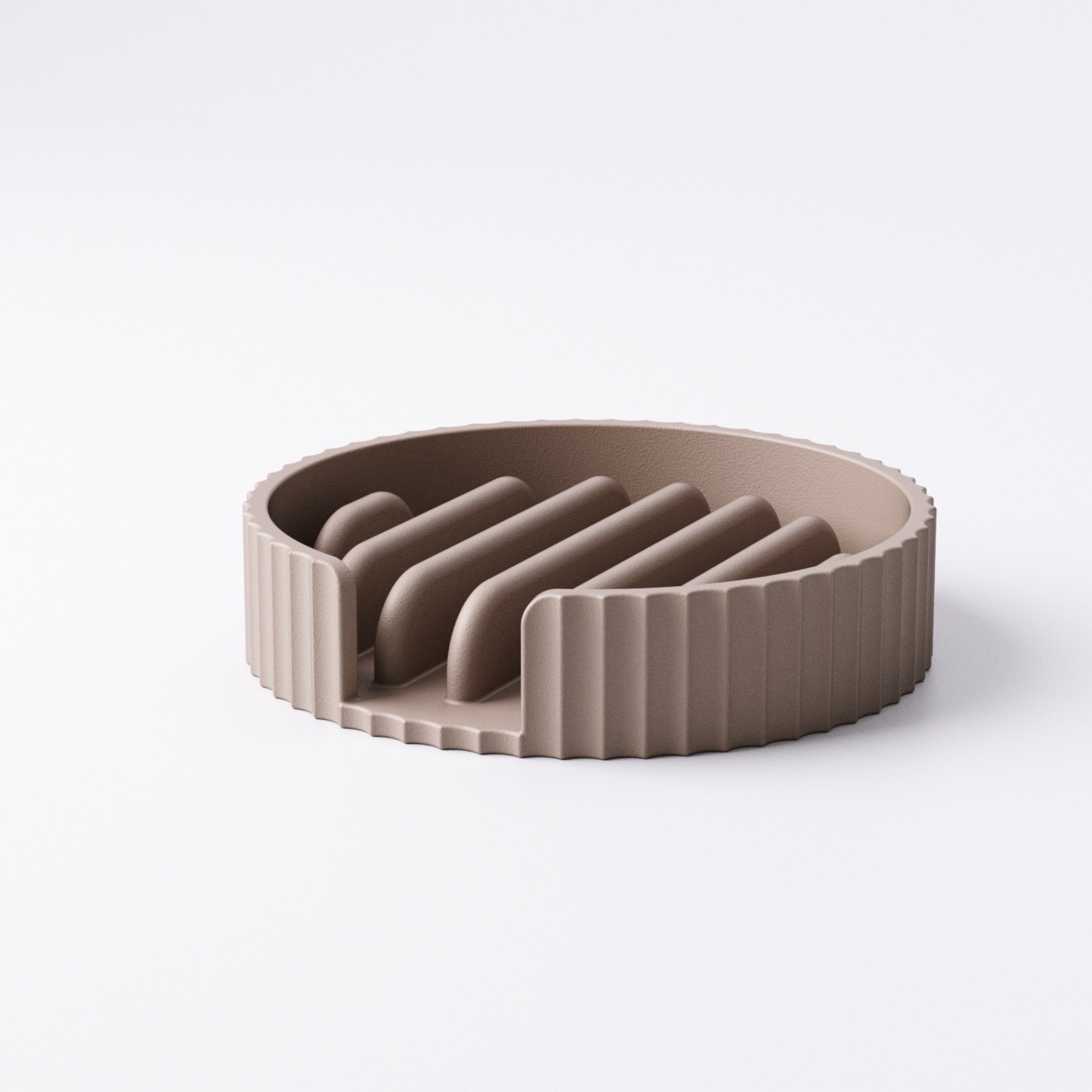 Ridged texture detail on the round soap tray showing water drainage grooves