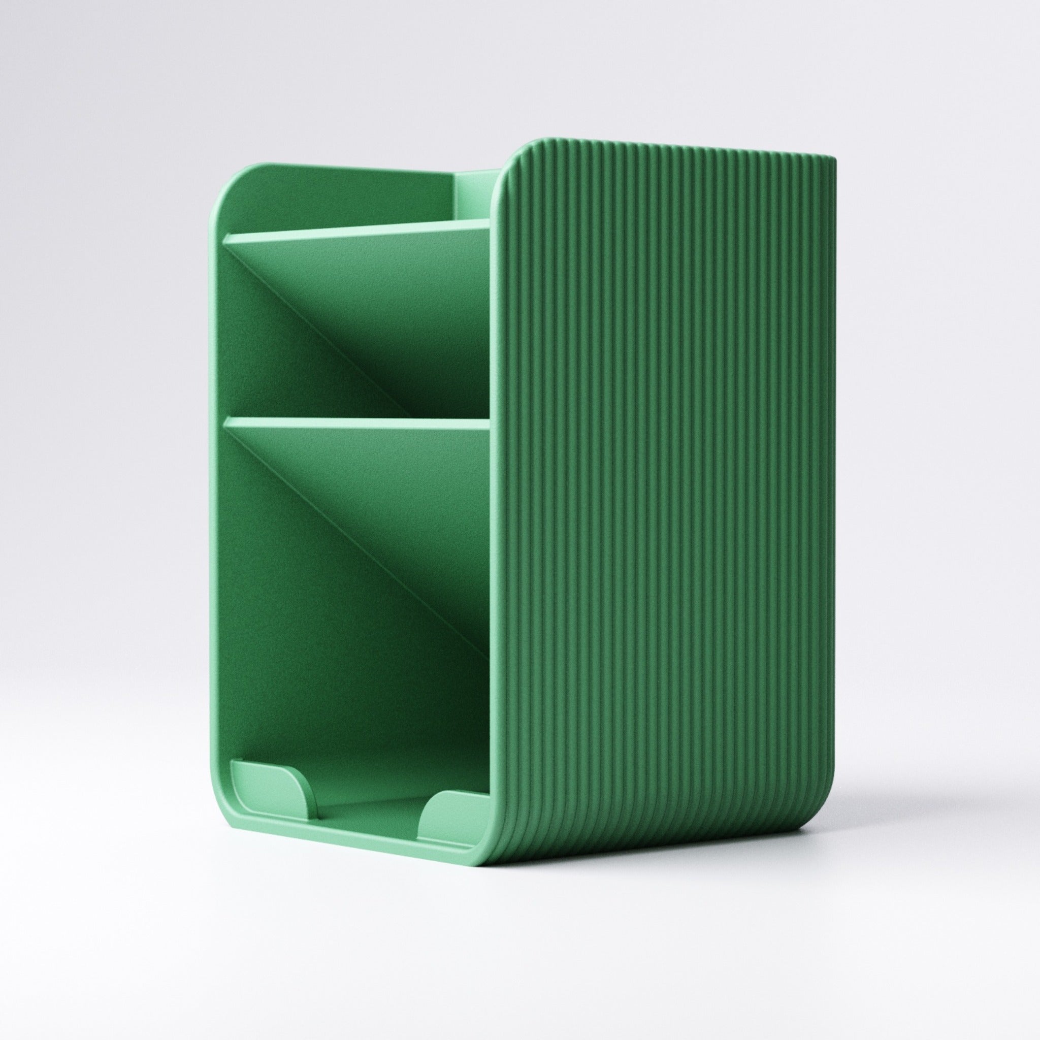 Small pen holder with three tiered sections holding pens and stationery