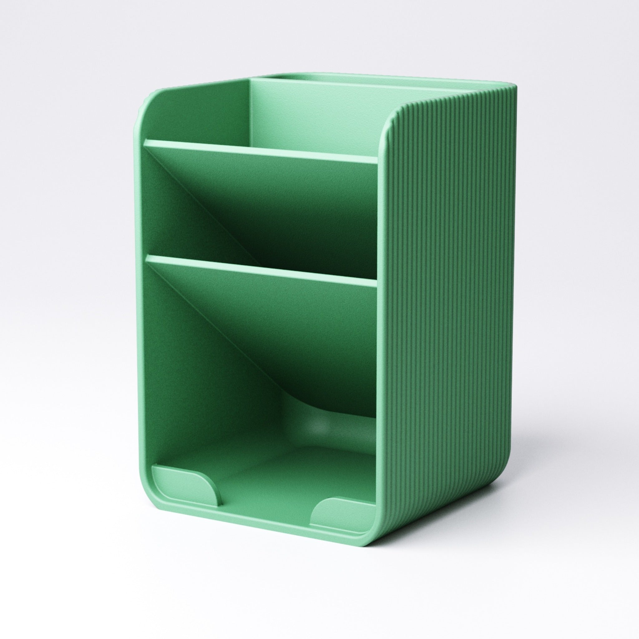 Tiered pen holder small version shown next to a laptop on a tidy desk