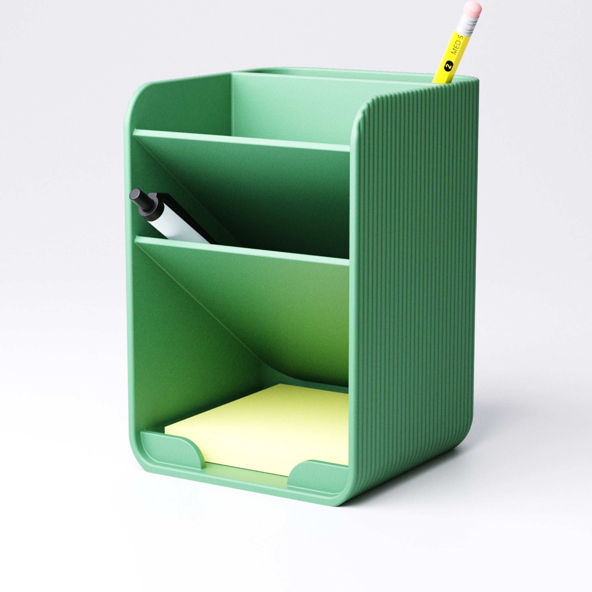 Compact desk organiser holding pens and loose stationery